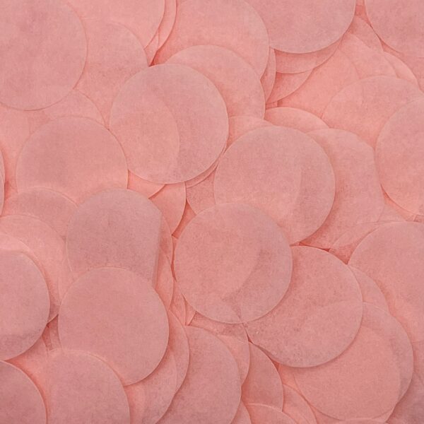 Pink paper confetti in a pile.